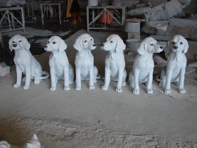 Carved Dogs Sculpture in Stone