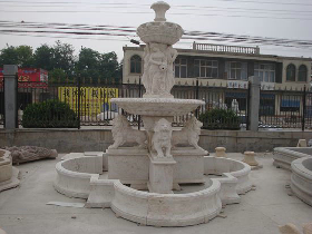 fountain with pool surrounds