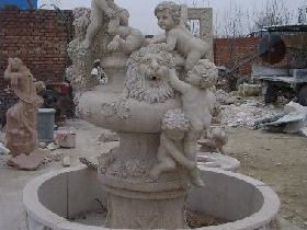 stone cherub wall fountain