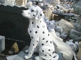 Granite dog with black spots