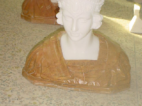 Elegant Lady Marble Busts in Red Cloth